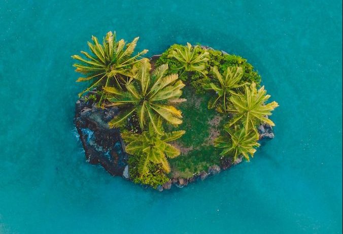 a small island in the middle of a body of water